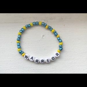Warrior beaded homemade bracelet teal and yellow